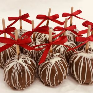 10 Caramel Dipped in Chocolate drizzled with White Chocolate in a Basket