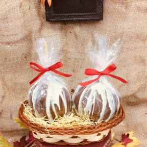 2 Chocolate dipped and Drizzled Caramel Apples in a Basket