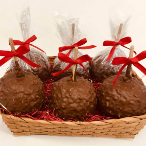 6 Caramel Apples with Peanuts dipped in Chocolate in a Basket