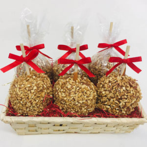 6 Large Caramel Apples with Peanuts in a Basket